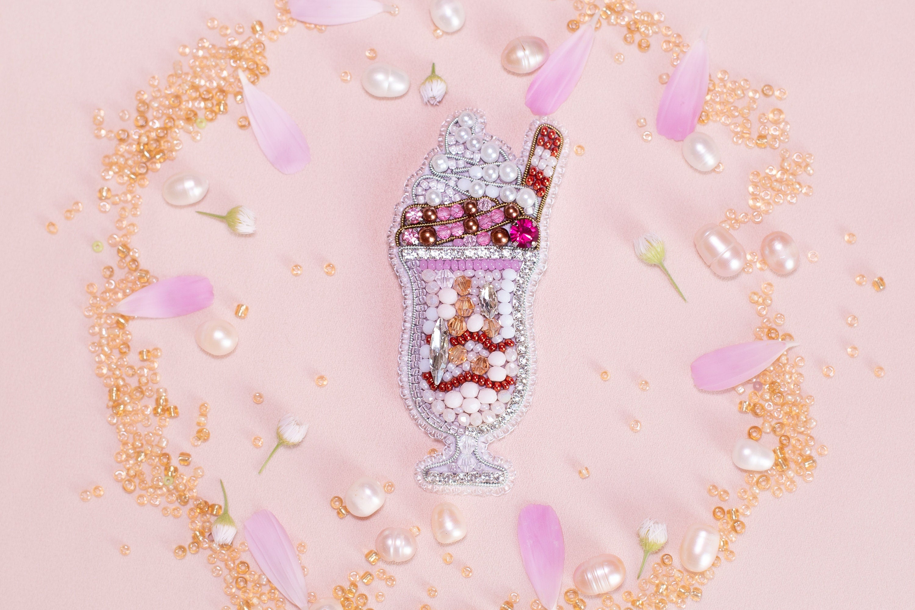 a bottle filled with lots of different types of beads